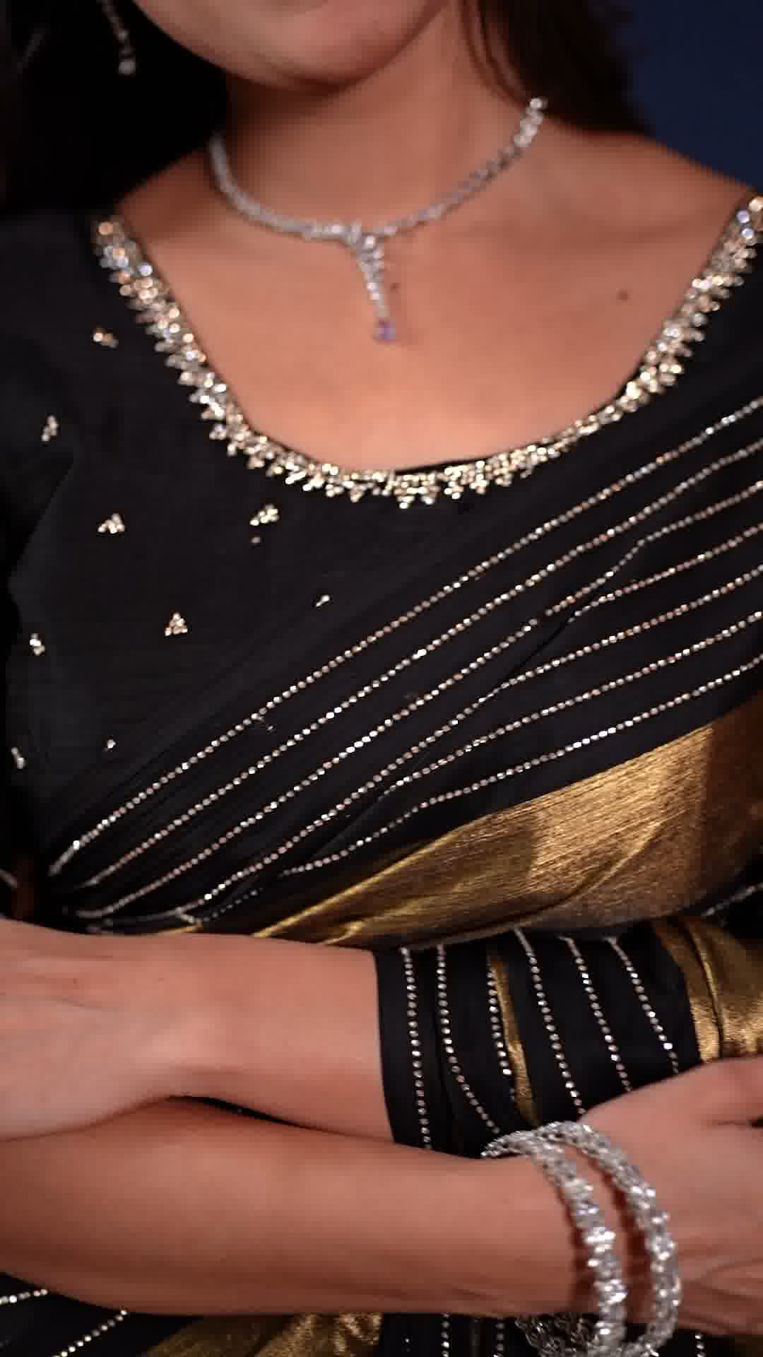 Black and golden party wear designer saree, third view