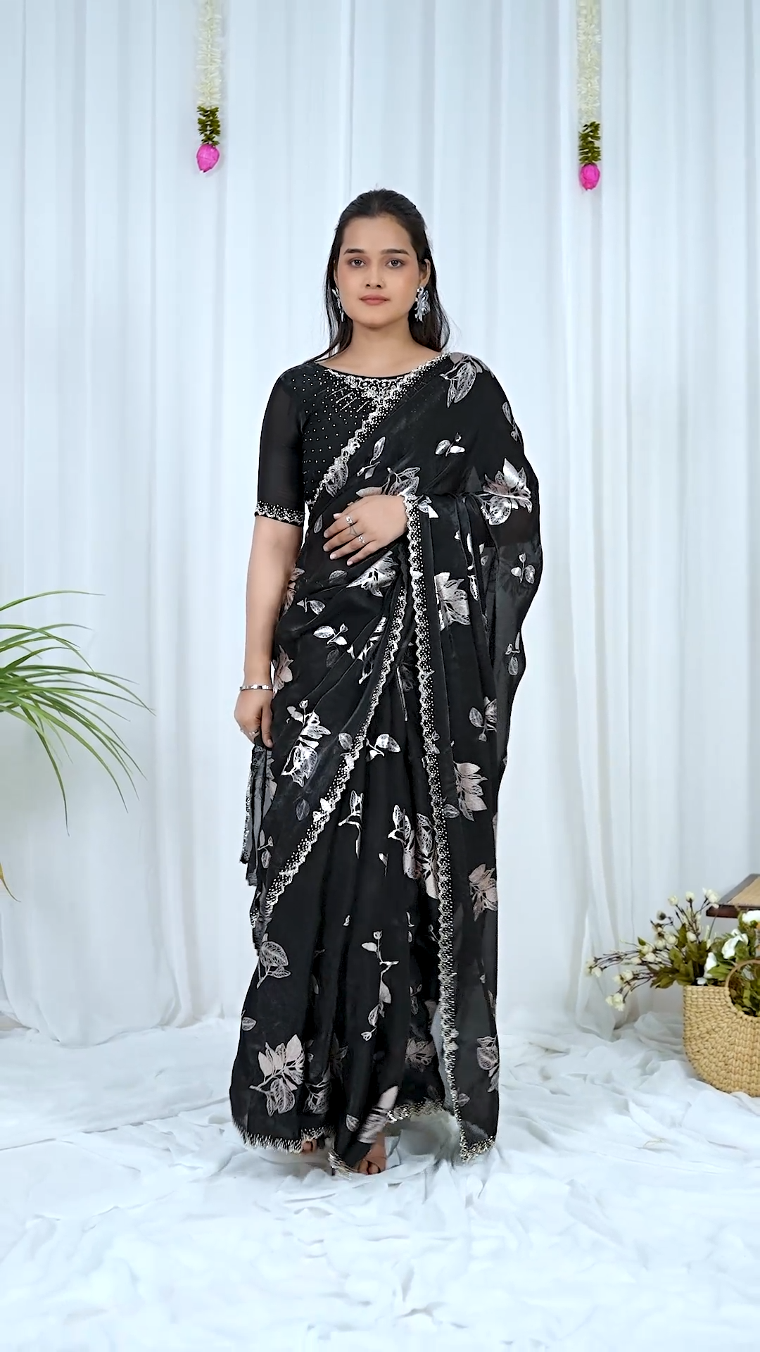 Black Fandy foil print saree with a silver floral foil design