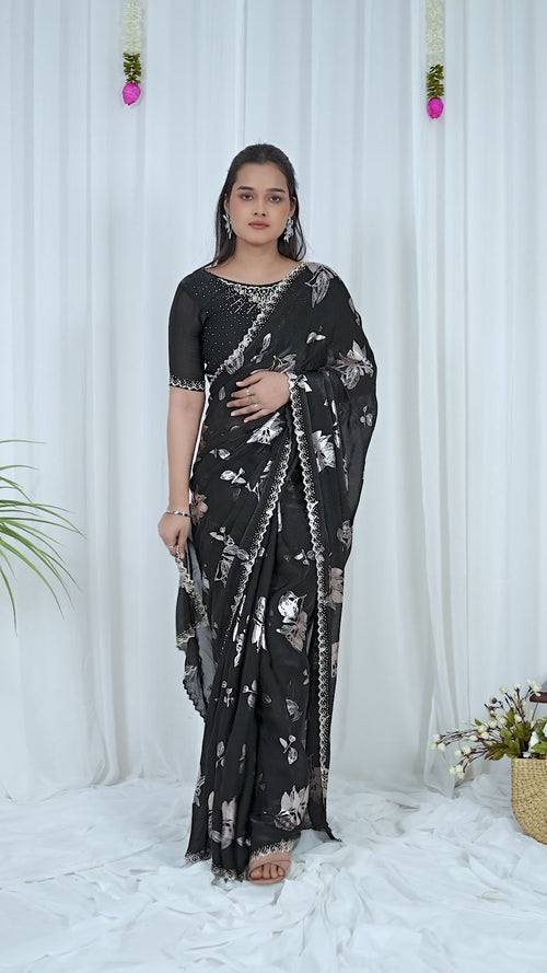 Video of the black Fandy foil print saree with silver floral design