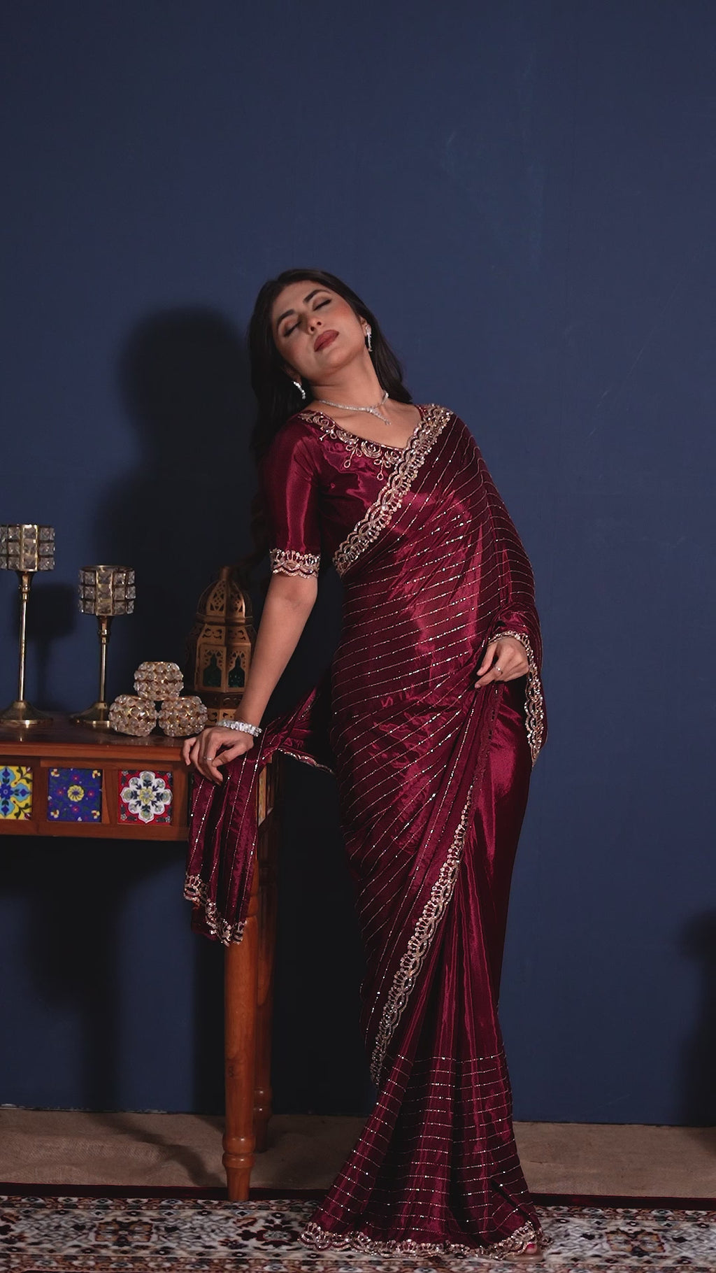 Video of the wine maroon embellished designer saree