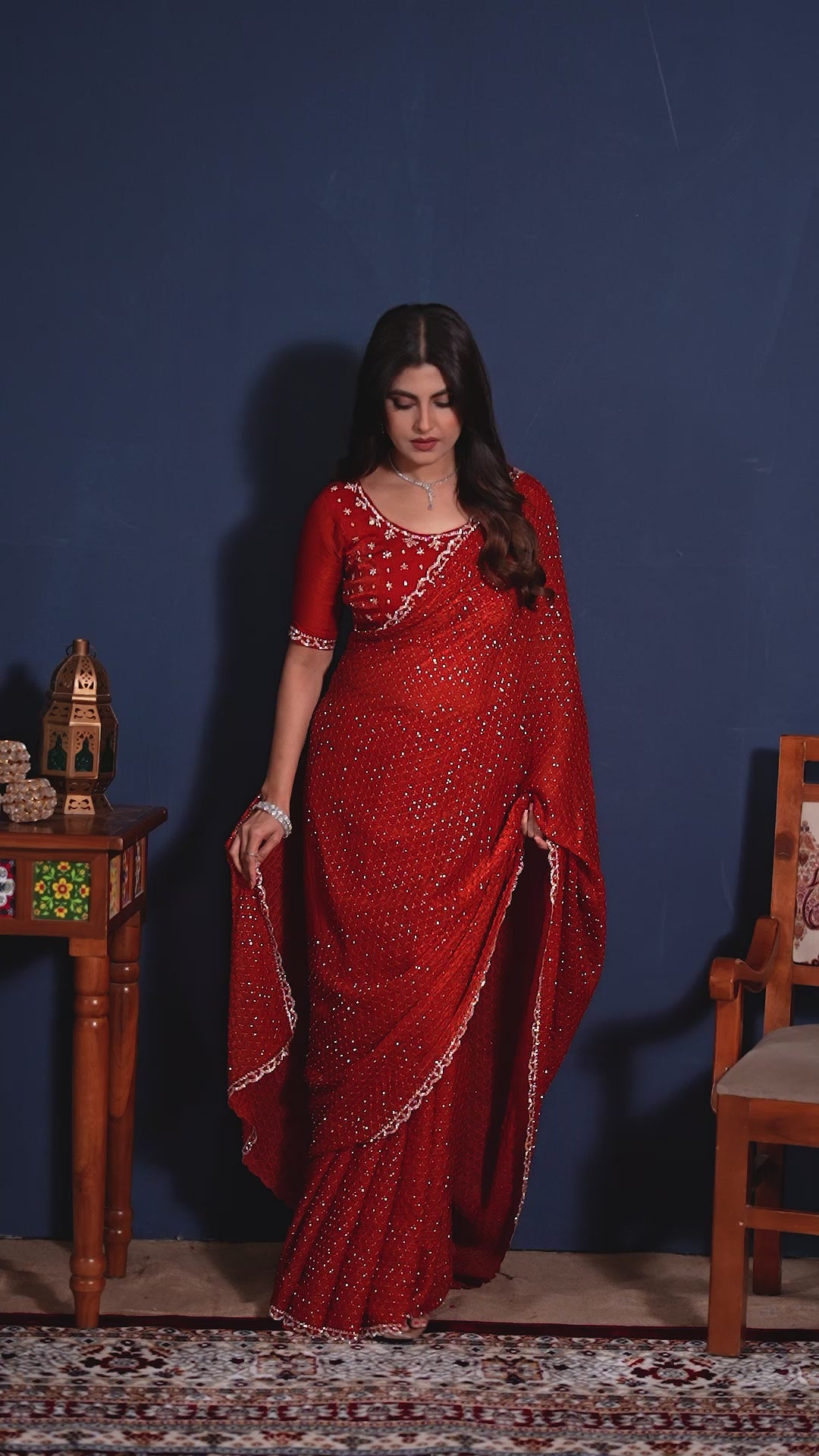 Video of the premium red embellished designer saree