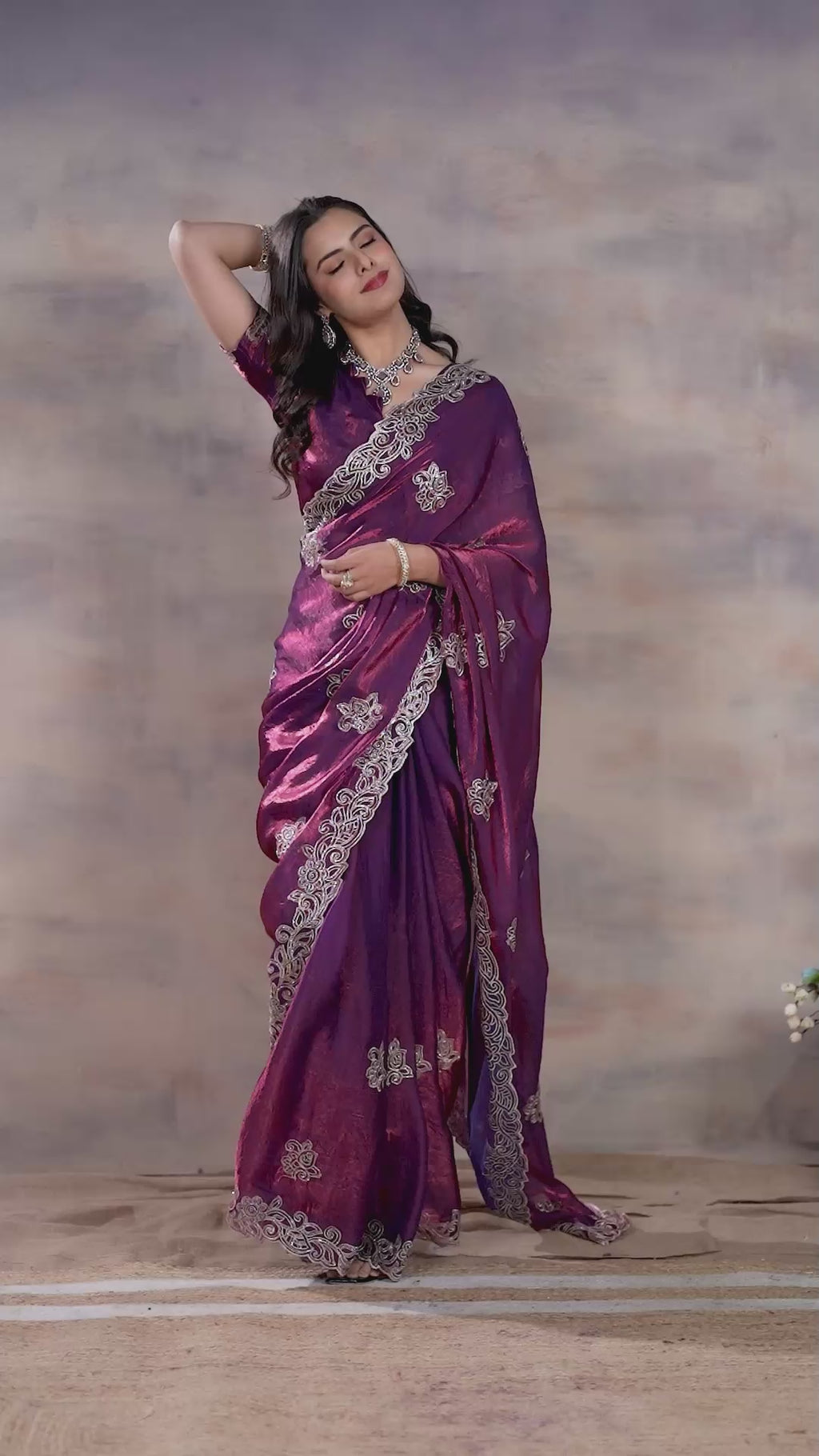 Video of the royal plum purple Fandy silk saree with silver embroidery